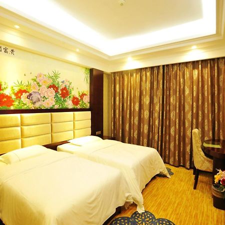 New West Street Hotel - Grand Wing Yangshuo Zimmer foto