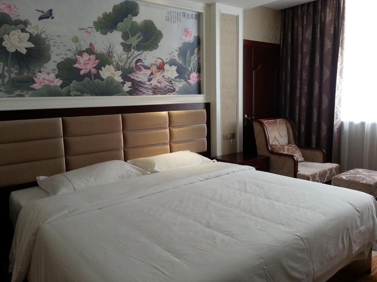 New West Street Hotel - Grand Wing Yangshuo Zimmer foto