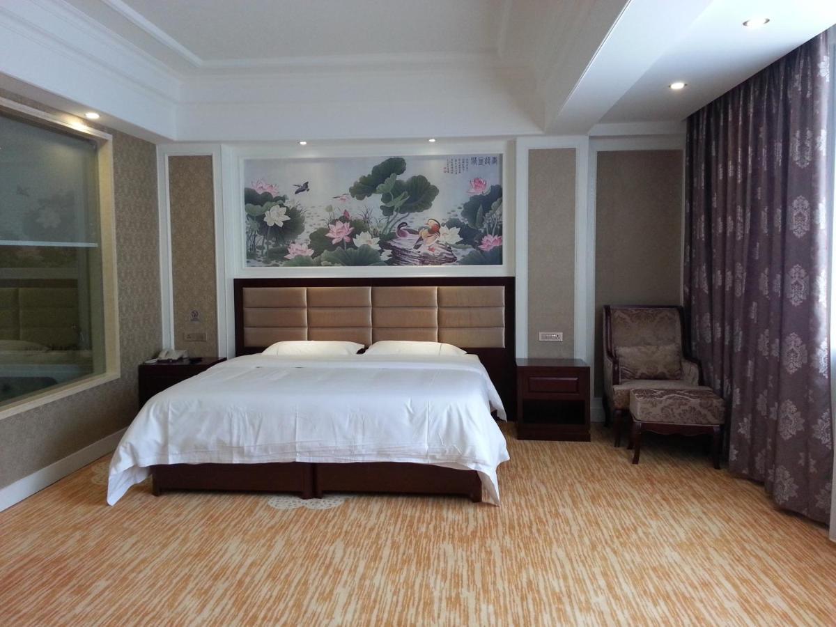 New West Street Hotel - Grand Wing Yangshuo Zimmer foto