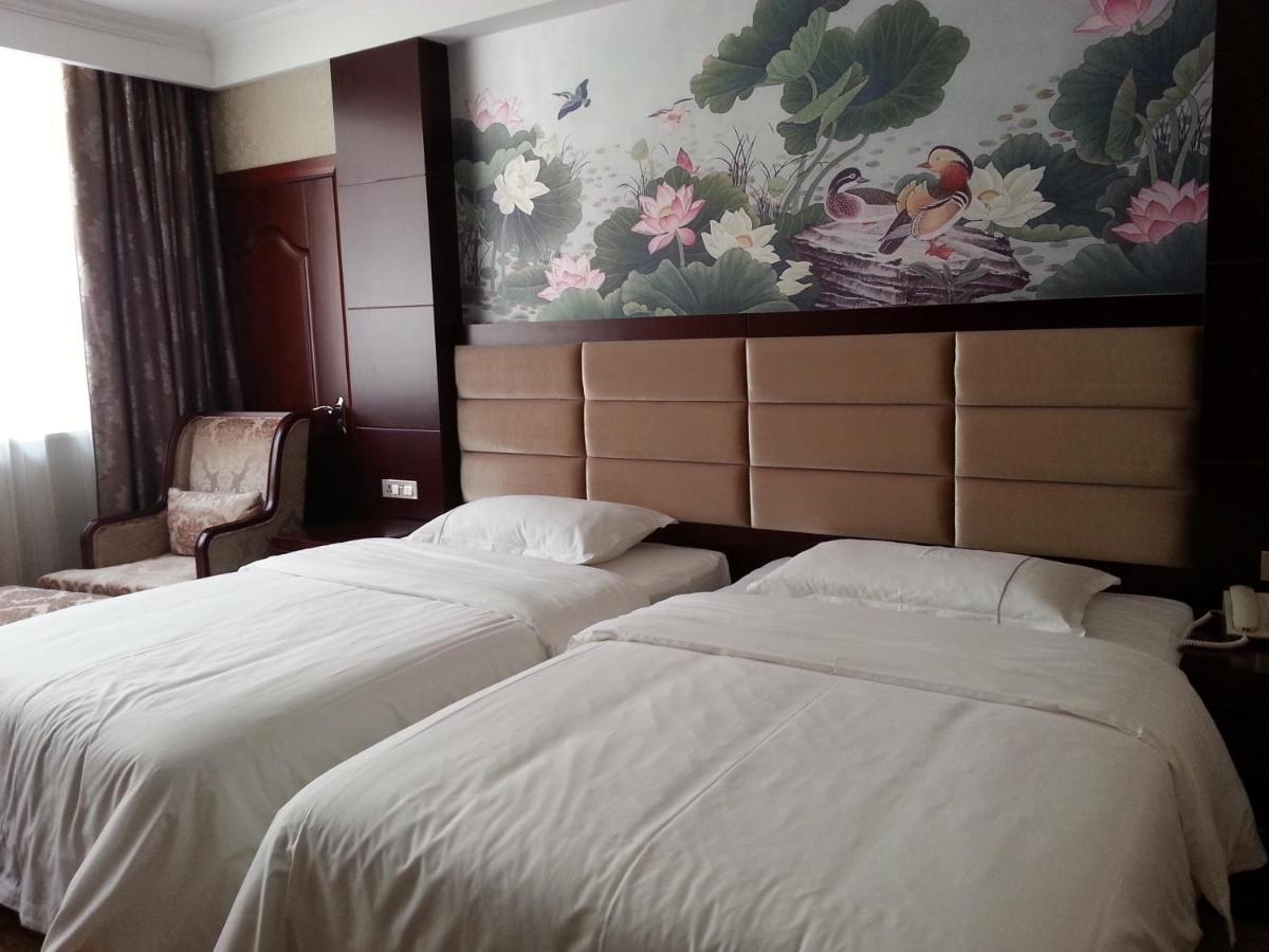 New West Street Hotel - Grand Wing Yangshuo Zimmer foto
